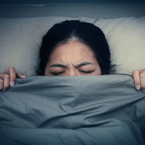 Woman suffering from nightmares